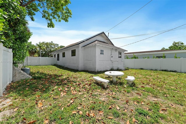 1683 NE 168th St, North Miami Beach, FL 33162 - view of yard featuring a fenced backyard