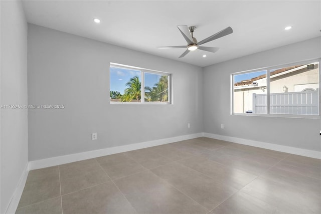 unfurnished room with plenty of natural light, a ceiling fan, and recessed lighting