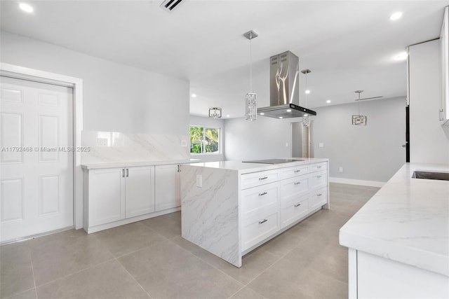 kitchen with white cabinets, black electric stovetop, a center island, island exhaust hood, and pendant lighting