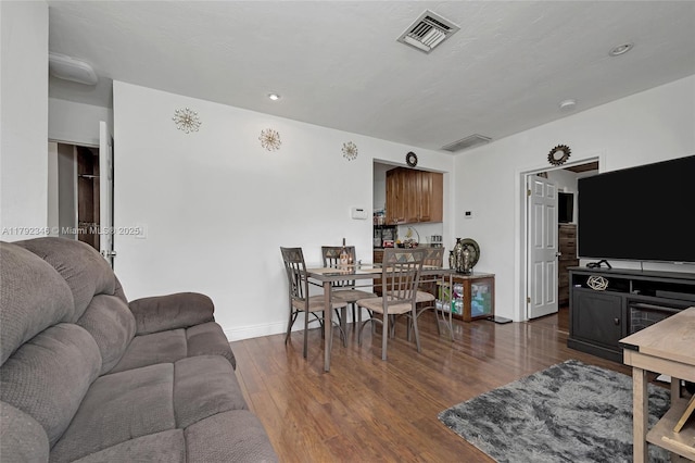 6550 SW 28th St, Miramar, FL 33023 - living room featuring dark wood-style flooring, visible vents, recessed lighting, and baseboards