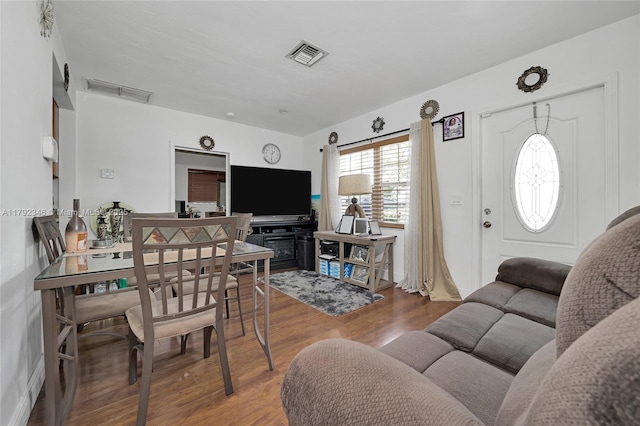 6550 SW 28th St, Miramar, FL 33023 - living room featuring visible vents and wood finished floors