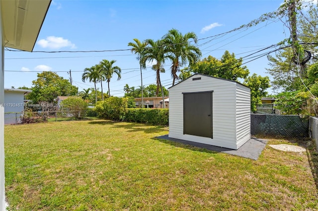 view of shed featuring a fenced backyard