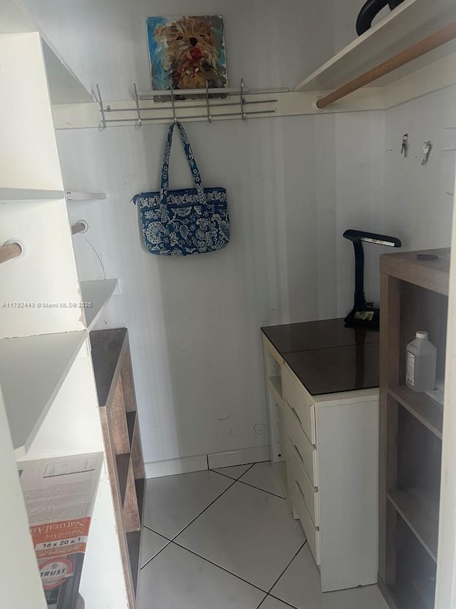 2841 NE 163rd St Unit 407, North Miami Beach, FL 33160 - spacious closet with light tile patterned flooring