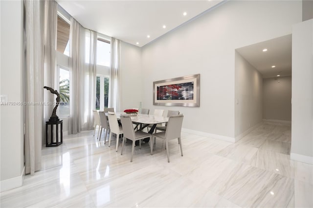 3425 Saddlebrook Ln, Weston, FL 33331 - dining space with baseboards, recessed lighting, and a towering ceiling