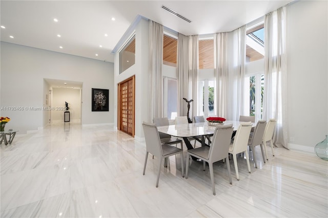3425 Saddlebrook Ln, Weston, FL 33331 - dining space featuring visible vents, recessed lighting, and a towering ceiling