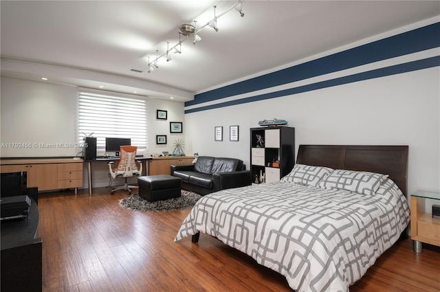 3425 Saddlebrook Ln, Weston, FL 33331 - bedroom featuring rail lighting, visible vents, and wood finished floors