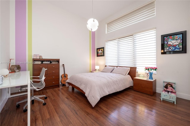 3425 Saddlebrook Ln, Weston, FL 33331 - bedroom with baseboards and wood finished floors