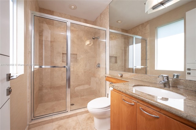 3425 Saddlebrook Ln, Weston, FL 33331 - bathroom with vanity, tile patterned floors, toilet, and a shower stall