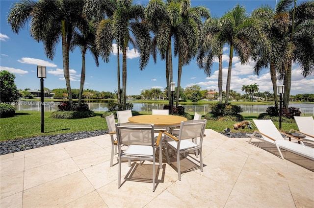 3425 Saddlebrook Ln, Weston, FL 33331 - view of patio featuring a water view, fence, and outdoor dining space