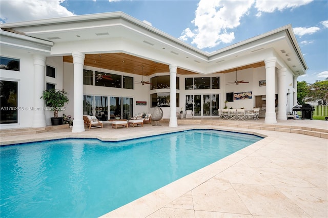 3425 Saddlebrook Ln, Weston, FL 33331 - rear view of property with an outdoor living space, a ceiling fan, a patio area, and an outdoor pool