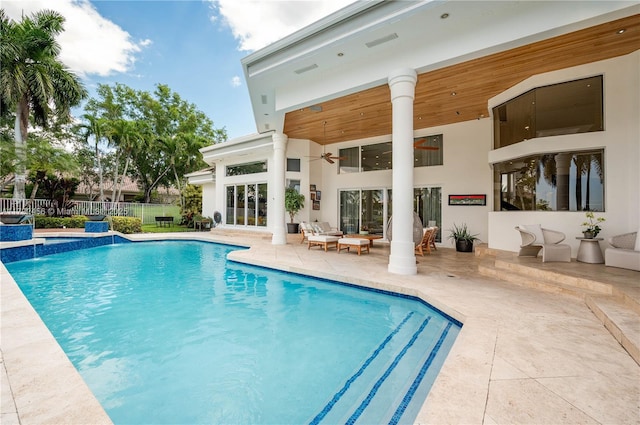 3425 Saddlebrook Ln, Weston, FL 33331 - view of swimming pool with fence, a patio, a fenced in pool, a ceiling fan, and an outdoor living space