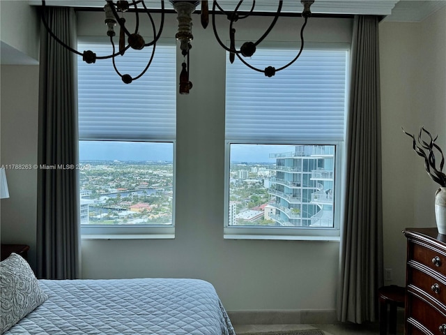 bedroom featuring baseboards
