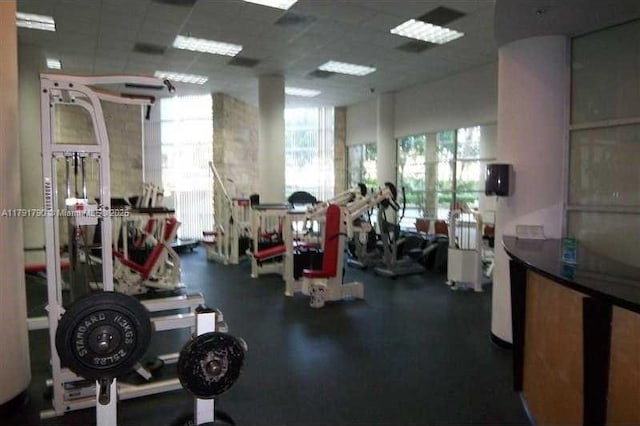 5161 Collins Ave Unit 506, Miami Beach, FL 33140 - workout area with a paneled ceiling