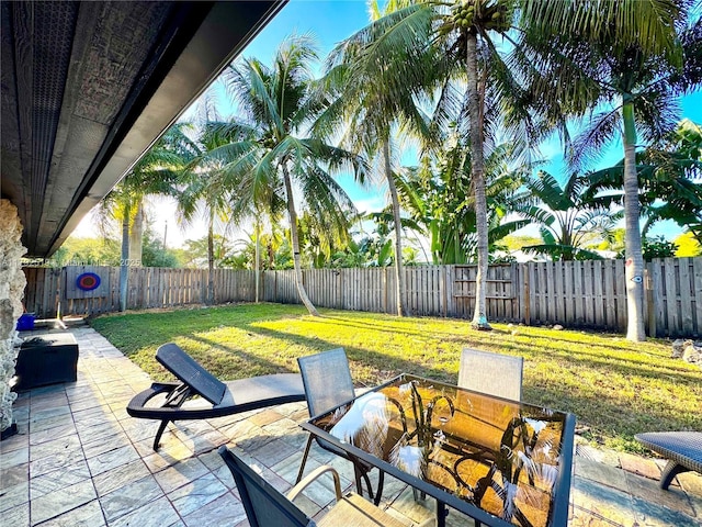 3699 Lakeview Blvd, Delray Beach, FL 33445 - view of patio / terrace with a fenced backyard and outdoor dining space