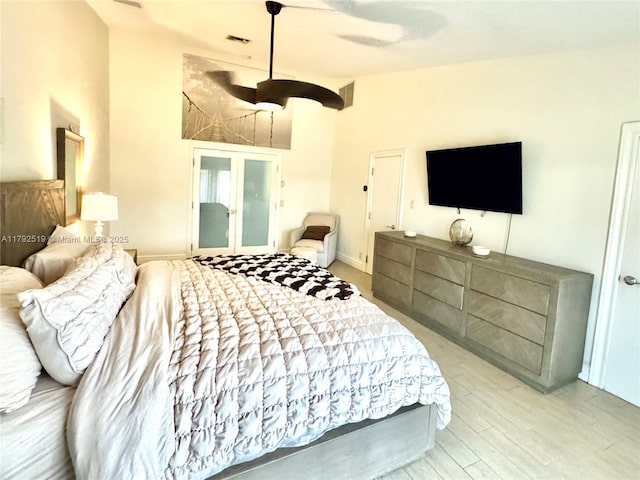 3699 Lakeview Blvd, Delray Beach, FL 33445 - bedroom with high vaulted ceiling, ceiling fan, wood finished floors, and visible vents