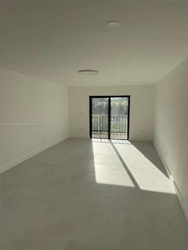 2939 Indian Creek Dr Unit 307, Miami Beach, FL 33140 - unfurnished room with light tile patterned flooring and baseboards