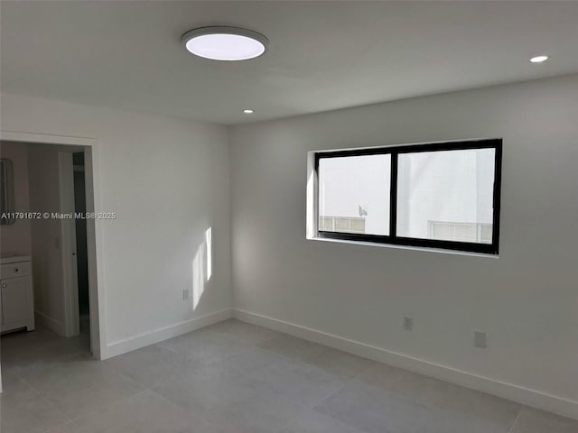 2939 Indian Creek Dr Unit 307, Miami Beach, FL 33140 - unfurnished room featuring light tile patterned flooring, baseboards, and recessed lighting
