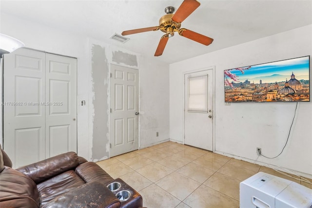 744 NW 7th St, Hallandale Beach, FL 33009 - living area with visible vents, a ceiling fan, and light tile patterned floors