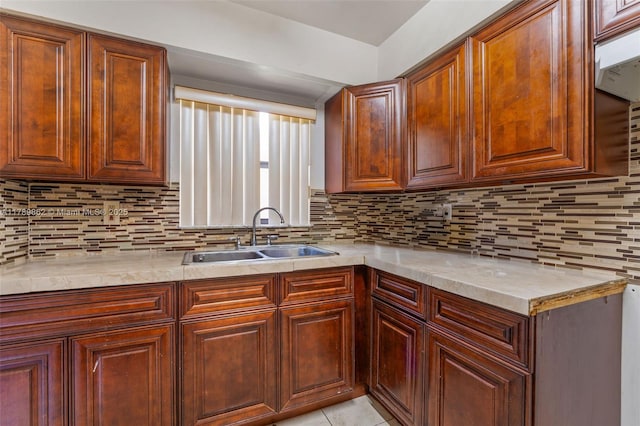 744 NW 7th St, Hallandale Beach, FL 33009 - kitchen with a sink, decorative backsplash, and light stone countertops