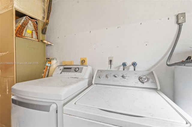 744 NW 7th St, Hallandale Beach, FL 33009 - washroom featuring laundry area and washing machine and dryer