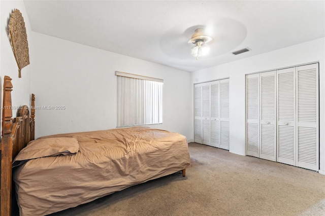 744 NW 7th St, Hallandale Beach, FL 33009 - bedroom featuring visible vents, ceiling fan, multiple closets, and carpet