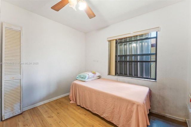 744 NW 7th St, Hallandale Beach, FL 33009 - bedroom featuring baseboards, a ceiling fan, and hardwood / wood-style floors