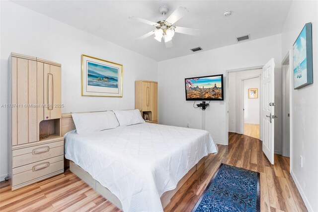 4971 Leeward Ln Unit 3004, Dania Beach, FL 33312 - bedroom with light wood-type flooring and ceiling fan