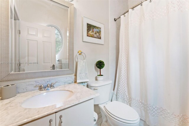 4971 Leeward Ln Unit 3004, Dania Beach, FL 33312 - bathroom with vanity and a shower with curtain