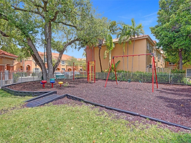 4971 Leeward Ln Unit 3004, Dania Beach, FL 33312 - communal playground with fence and a lawn