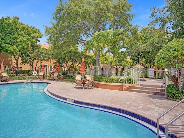4971 Leeward Ln Unit 3004, Dania Beach, FL 33312 - community pool featuring a patio