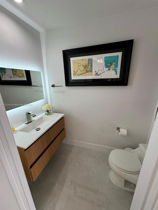 808 Brickell Key Dr Unit 3007, Miami, FL 33131 - half bath featuring toilet, vanity, and baseboards