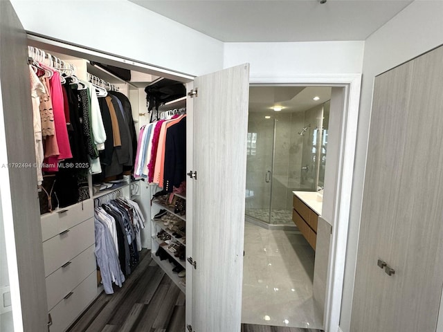 808 Brickell Key Dr Unit 3007, Miami, FL 33131 - full bath featuring vanity, a stall shower, and a walk in closet