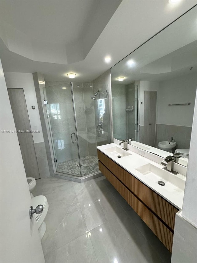 808 Brickell Key Dr Unit 3007, Miami, FL 33131 - full bath with a bidet, toilet, a shower stall, double vanity, and marble look tiles