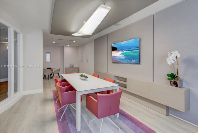 808 Brickell Key Dr Unit 3007, Miami, FL 33131 - dining space with light wood-style floors and baseboards