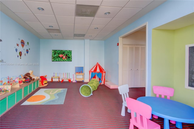 808 Brickell Key Dr Unit 3007, Miami, FL 33131 - playroom with carpet and a paneled ceiling
