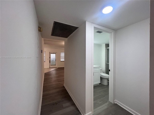 3089 E Yarmouth E Unit 3089, Boca Raton, FL 33434 - hallway with wood finished floors and baseboards