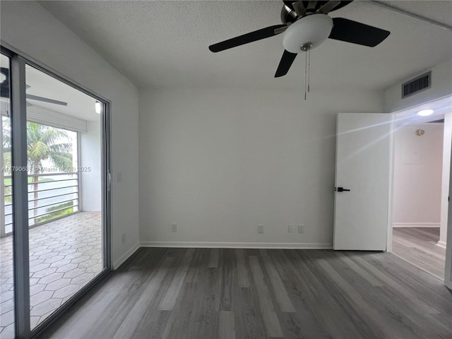 3089 E Yarmouth E Unit 3089, Boca Raton, FL 33434 - unfurnished room with dark wood-style floors and a ceiling fan