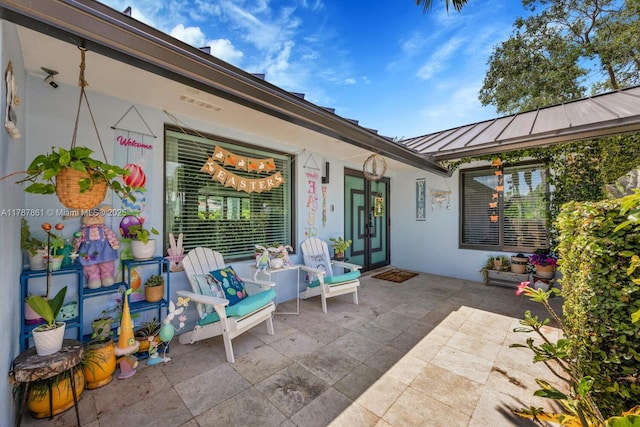 7864 SW 179th Ter, Palmetto Bay, FL 33157 - view of patio featuring french doors