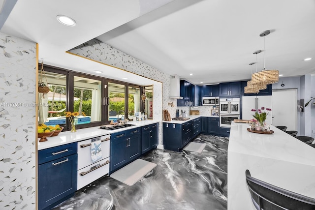7864 SW 179th Ter, Palmetto Bay, FL 33157 - kitchen with white appliances, light countertops, wall chimney exhaust hood, and blue cabinets