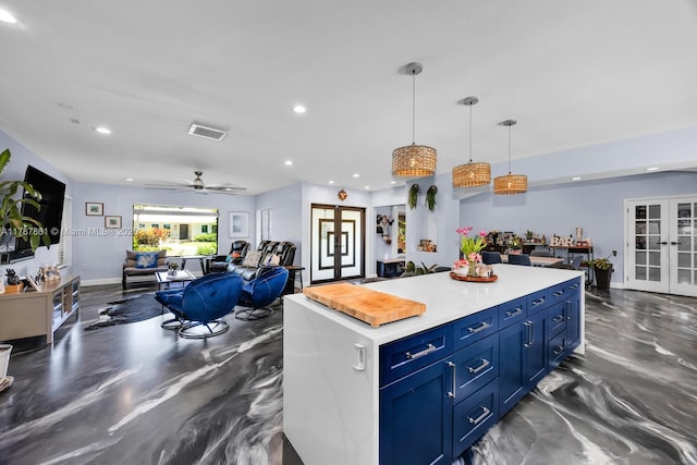7864 SW 179th Ter, Palmetto Bay, FL 33157 - kitchen featuring french doors, visible vents, light countertops, open floor plan, and recessed lighting