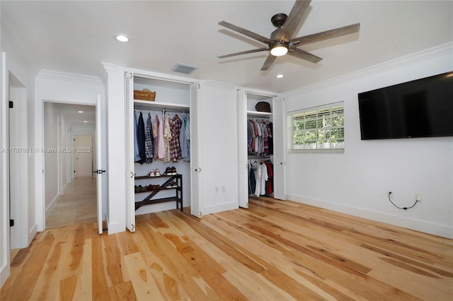 7864 SW 179th Ter, Palmetto Bay, FL 33157 - unfurnished bedroom featuring two closets, baseboards, visible vents, and ornamental molding