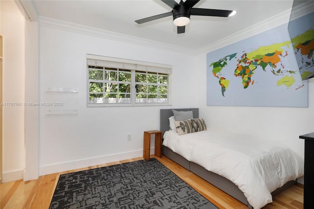 7864 SW 179th Ter, Palmetto Bay, FL 33157 - bedroom with crown molding, baseboards, a ceiling fan, and wood finished floors