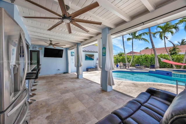7864 SW 179th Ter, Palmetto Bay, FL 33157 - view of pool with a ceiling fan, outdoor dining space, a pool with connected hot tub, and a patio area