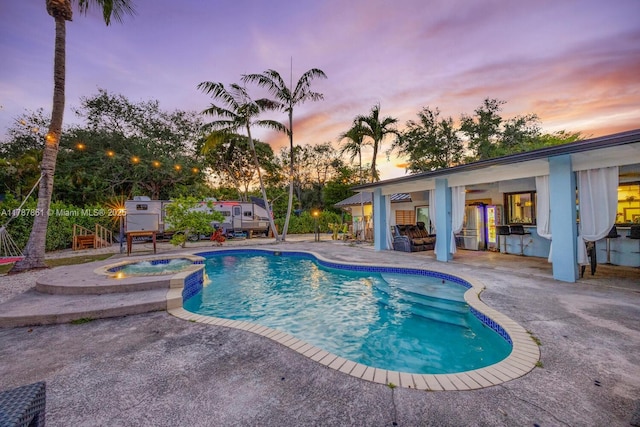 7864 SW 179th Ter, Palmetto Bay, FL 33157 - view of swimming pool featuring a patio and a pool with connected hot tub