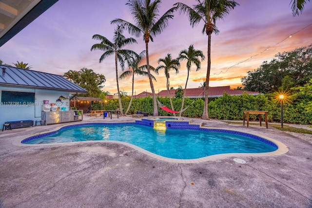 7864 SW 179th Ter, Palmetto Bay, FL 33157 - view of swimming pool with a pool with connected hot tub and a patio area