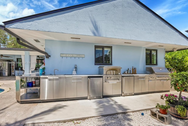 7864 SW 179th Ter, Palmetto Bay, FL 33157 - view of patio / terrace with visible vents, a sink, a grill, and area for grilling