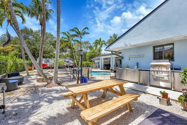 7864 SW 179th Ter, Palmetto Bay, FL 33157 - view of patio featuring area for grilling and an outdoor pool