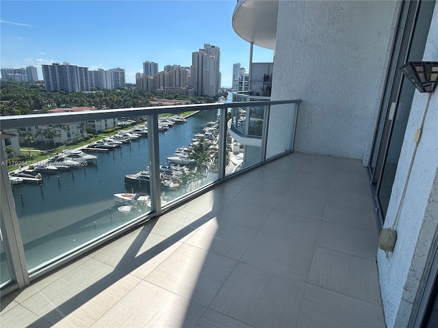 3029 NE 188th St Unit 905, Aventura, FL 33180 - balcony with a skyline view, view of marina, and a water view