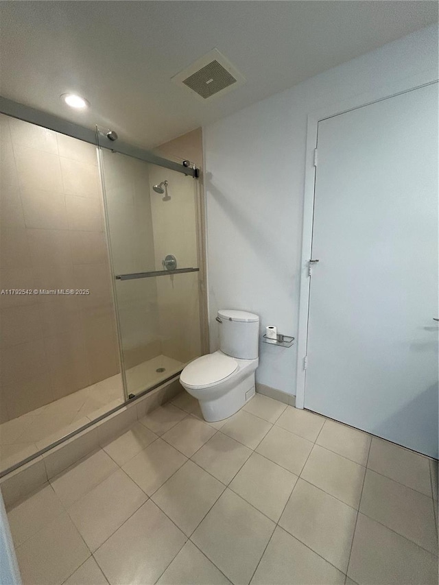 3029 NE 188th St Unit 905, Aventura, FL 33180 - bathroom with tile patterned flooring, a stall shower, and recessed lighting