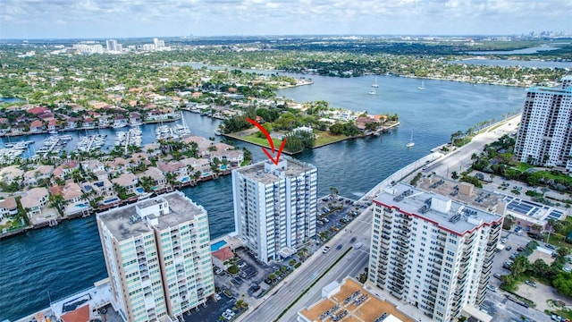 aerial view featuring a water view and a city view
